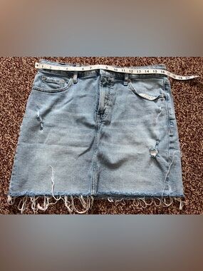 Light Wash Distressed Denim Mini Skirt